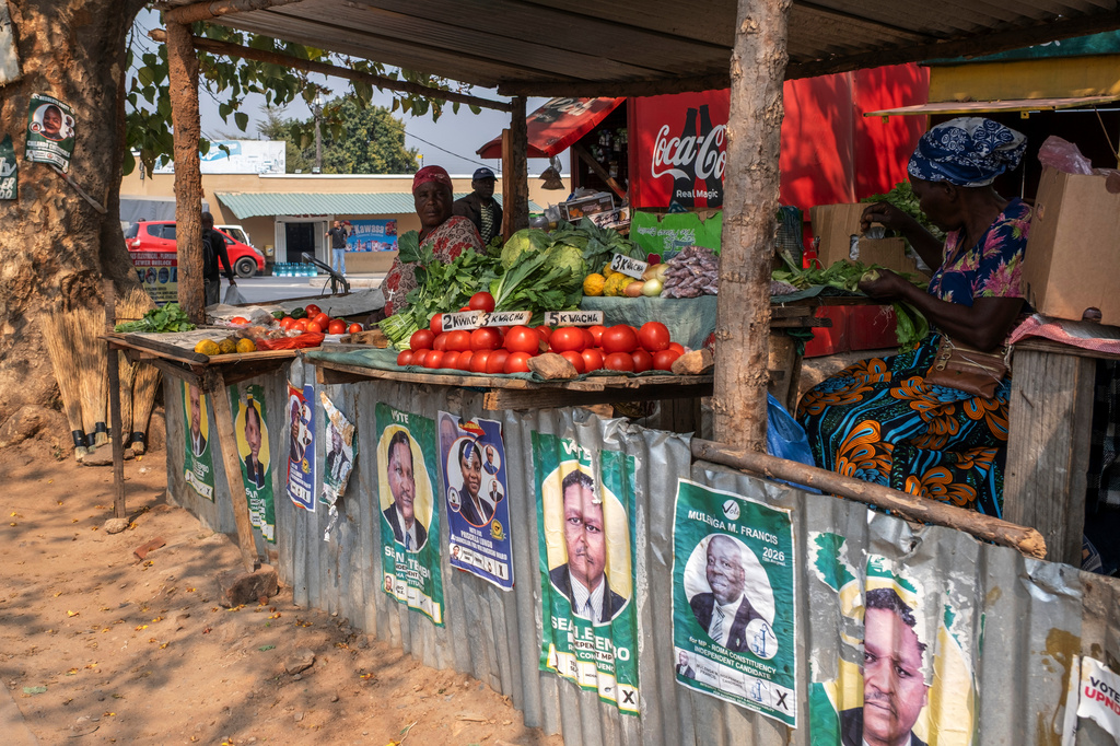 Street vendors selling vegetables on the outskirts of Lusaka, Zambia, Monday, Aug. 10, 2026. (AP Photo/Anita Reed)