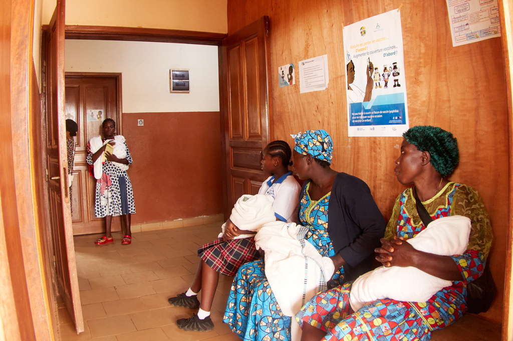Mothers with their babies attend the malaria vaccination rollout at the Soa District Hospital in Yaounde, Cameroon, Wednesday, April 29, 2026. (AP Photo/Angel Ngwe)