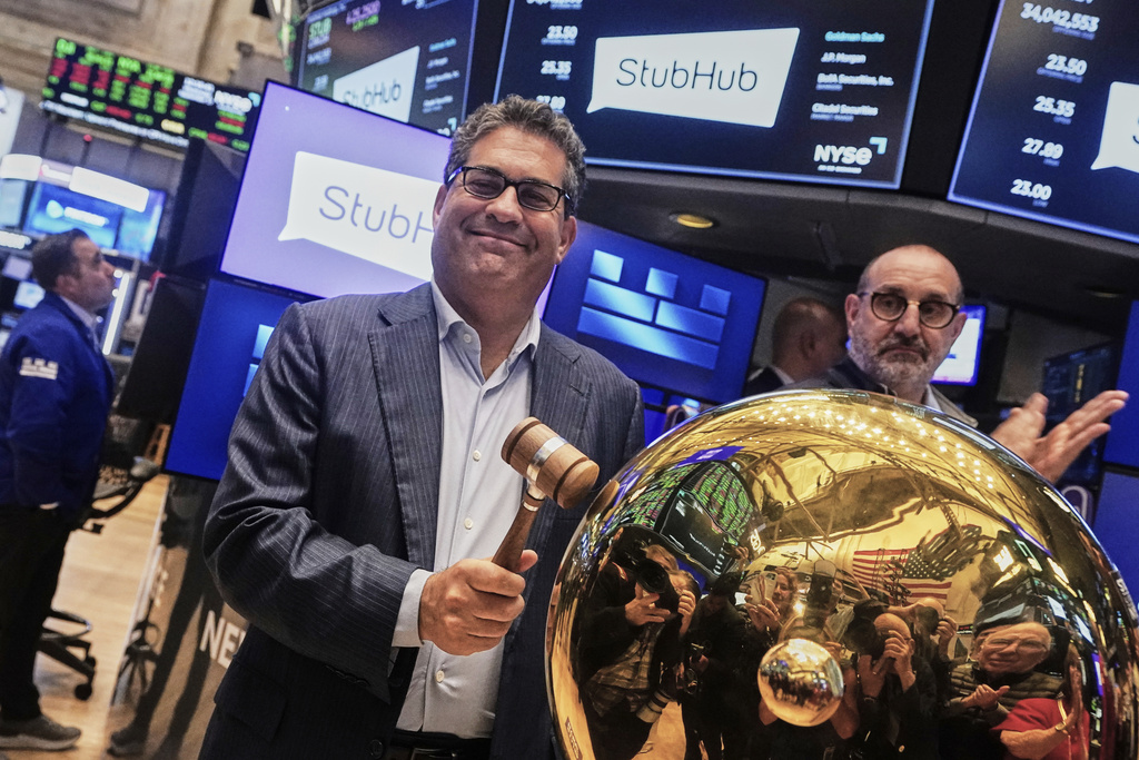 StubHub CEO Eric Baker rings a ceremonial bell as his company stock begins trading, on the floor of the New York Stock Exchange, Wednesday, Sept. 17, 2025. (AP Photo/Richard Drew)
