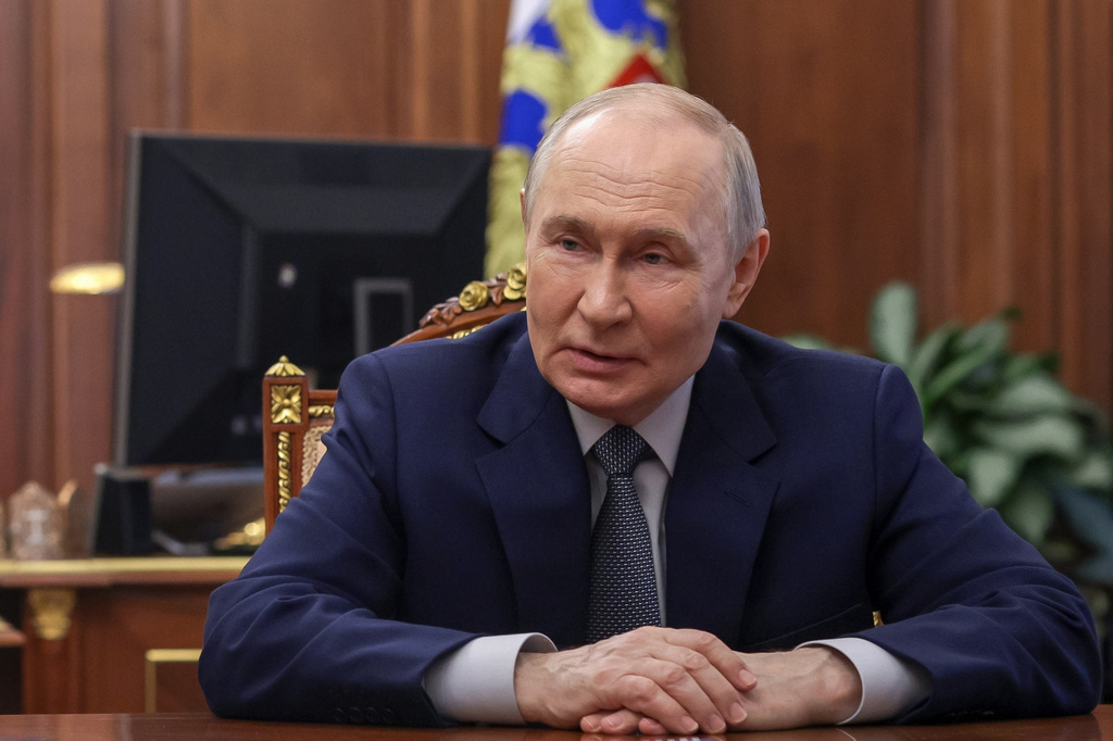 Russian President Vladimir Putin listens to Head of the Republic of Mordovia Artyom Zdunov at the Kremlin in Moscow, Monday, May 4, 2026. (Mikhail Metzel/Sputnik, Kremlin Pool Photo via AP)
