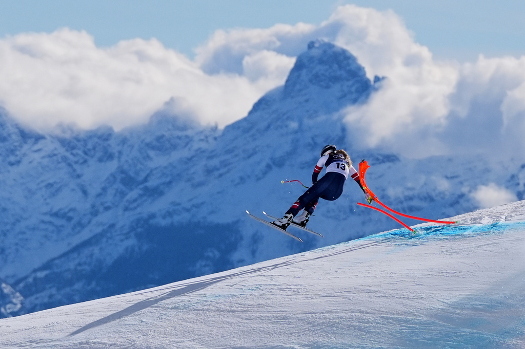 FILE - United States' Lindsey Vonn crashes into a gate during an alpine ski women's downhill race, at the 2026 Winter Olympics, in Cortina d'Ampezzo, Italy, Sunday, Feb. 8, 2026. (AP Photo/Jacquelyn Martin, File)
