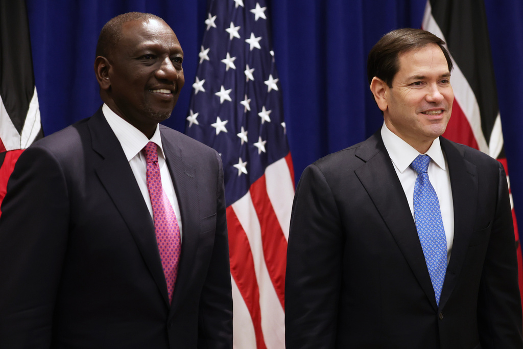 FILE - U.S. Secretary of State Marco Rubio, right, and Kenyan President William Ruto pose for photos before a meeting, Sept. 24, 2025, in New York. (AP Photo/Heather Khalifa, Pool, file)