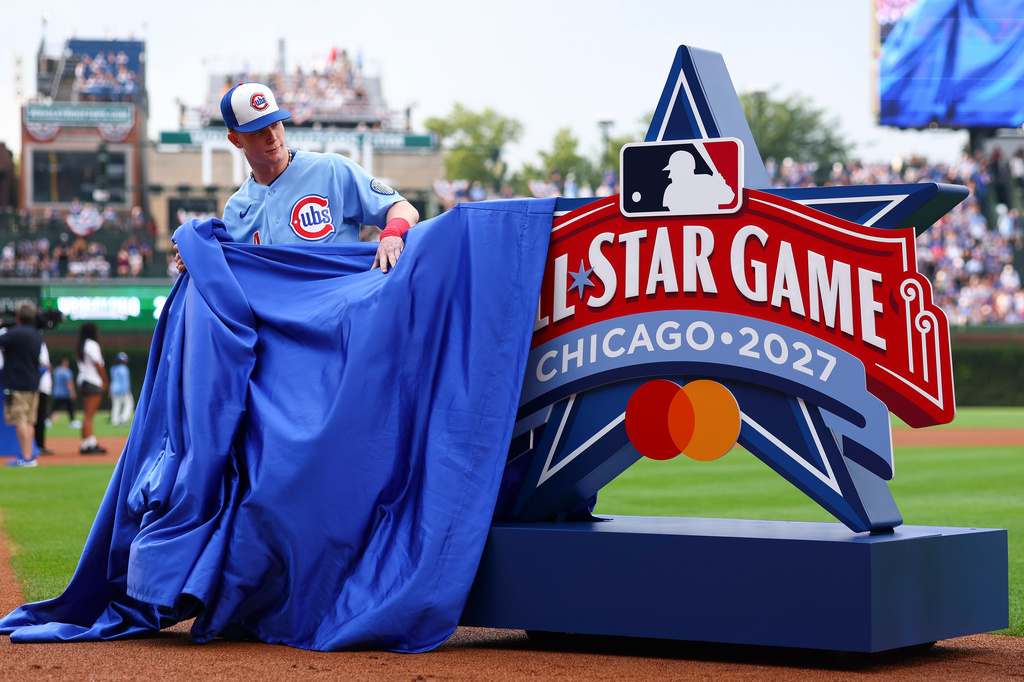 Chicago Cubs' Pete Crow-Armstrong reveals the 2027 MLB All-Star Game logo before a baseball game against the Minnesota Twins in Chicago, Friday, July 17, 2026. (AP Photo/Jessie Alcheh)