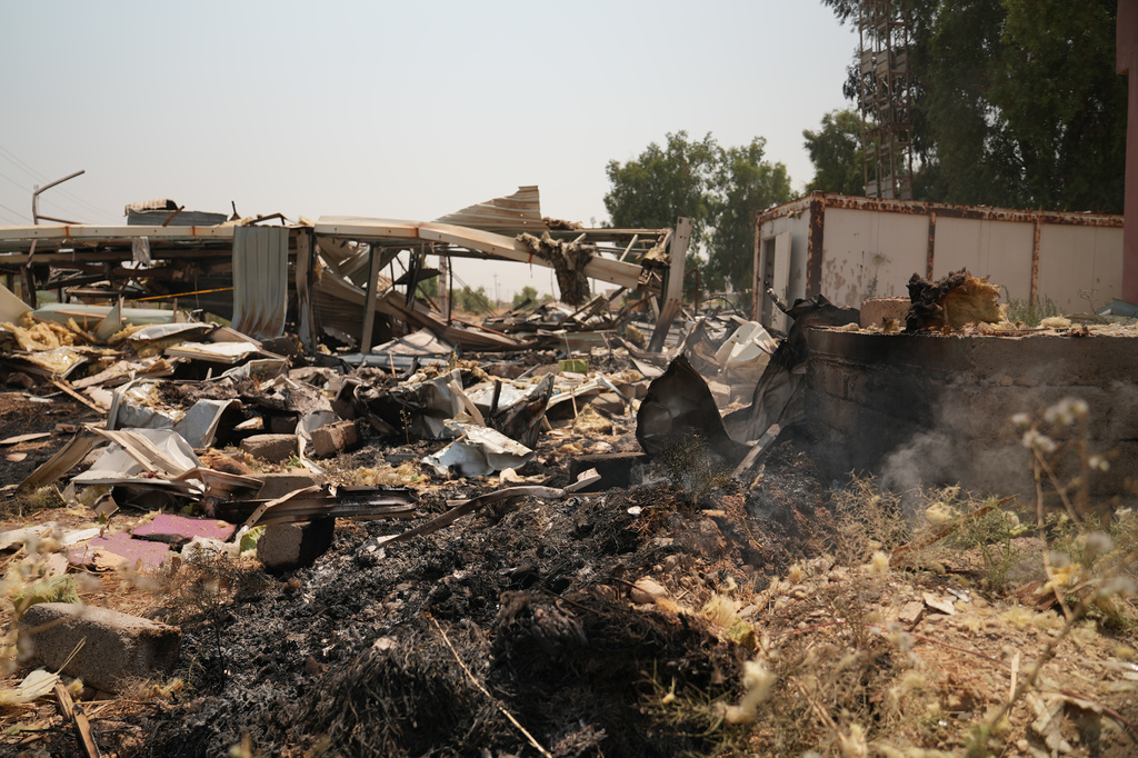 Damaged structures at the site of an airstrike on a Popular Mobilization Forces base in Mosul, Iraq, Wednesday, July 29, 2026. (AP Photo/Farid Abdulwahed)