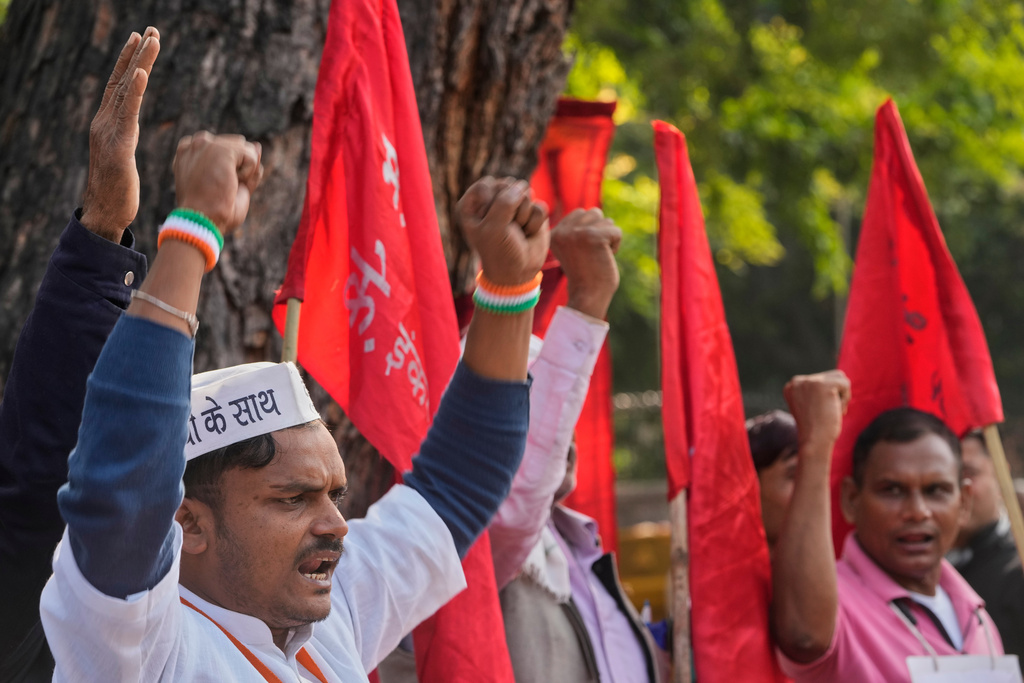 Members of various Indian trade unions shout slogans during a protest against the government's rollout of new labor codes in New Delhi, India, Wednesday, Nov. 26, 2025. (AP Photo/Manish Swarup)
