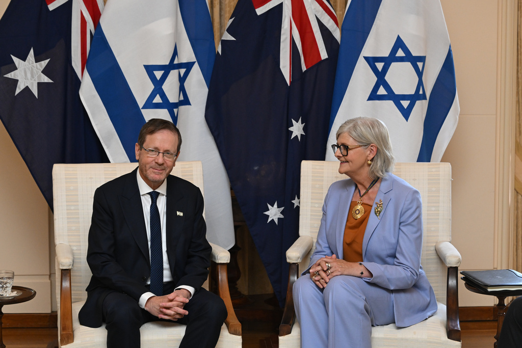 Israeli President Isaac Herzog, left, meets with Australian Governor-General Sam Mostyn during a visit to Government House in Canberra, Australia, Wednesday, Feb. 11, 2026. (Lukas Coch/AAP Image via AP)