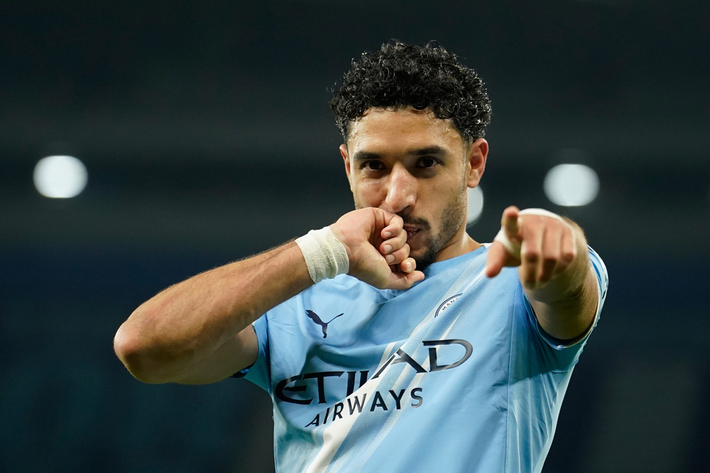 Manchester City's Omar Marmoush celebrates after scoring during the English League Cup semifinal soccer match soccer match between Manchester City and Newcastle in Manchester, England, Wednesday, Feb. 4, 2026. (AP Photo/Dave Thompson)