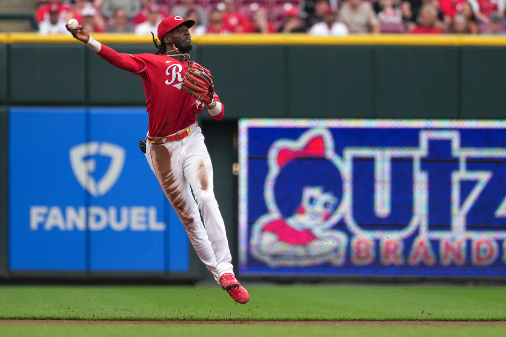Cincinnati Reds shortstop Elly de la Cruz throws to first base for a out of Colorado Rockies' Kyle Karros (not shown) during the second inning of a baseball game against the Colorado Rockies', Tuesday, April 28, 2026, in Cincinnati. (AP Photo/Kareem Elgazzar)