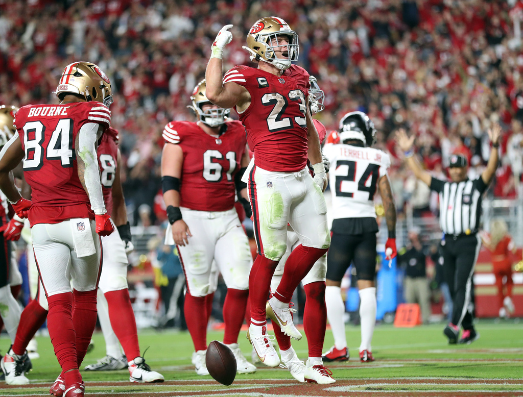 San Francisco 49ers' Christian McCaffrey celebrates his fourth quarter rushing touchdown, his second of the game, during an NFL football game in Santa Clara, Calif., on Sunday, Oct. 19, 2025. (Scott Strazzantez/San Francisco Chronicle via AP)