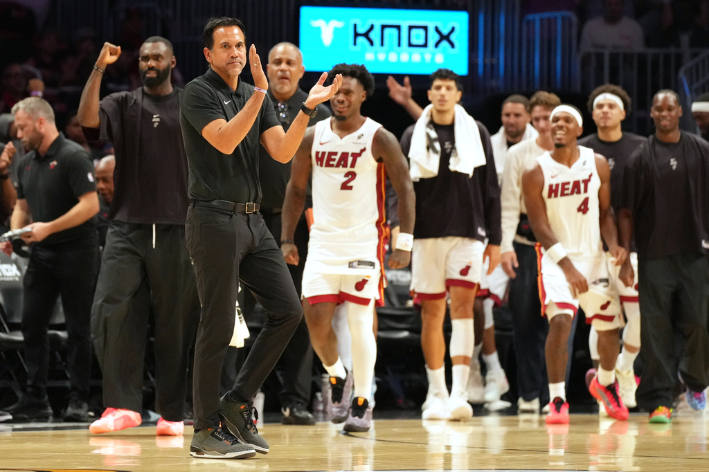 Miami Heat head coach Erik Spoelstra applauds at the end of the second half of an NBA preseason basketball game against the New Orleans Pelicans Thursday, Oct. 8, 2026, in Miami. (AP Photo/Marta Lavandier)