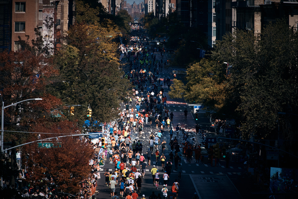 Runners move along First Avenue during the New York City Marathon in New York, Sunday, Nov. 2, 2025. (AP Photo/Andres Kudacki)
