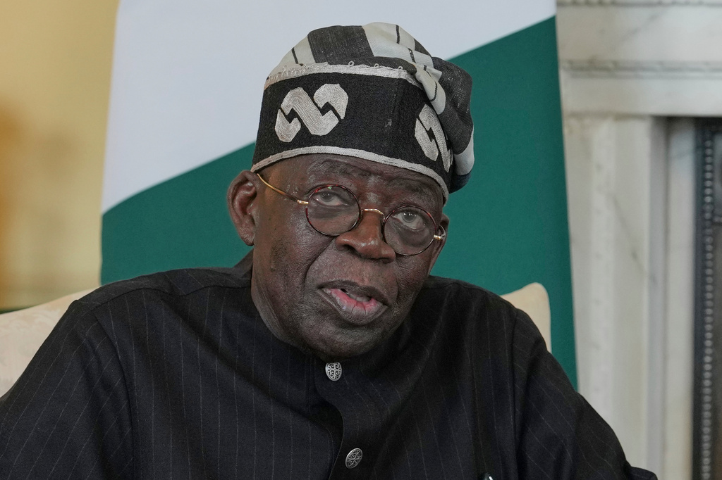 FILE -Nigerian President Bola Tinubu speaks to the media ahead of his meeting with Britain's Prime Minister Keir Starmer inside 10 Downing Street in London, Thursday, March 19, 2026. (AP Photo/Kin Cheung, Pool, File)