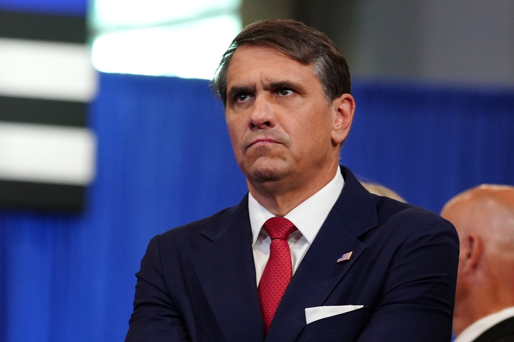Attorney General Todd Blanche listens as President Donald Trump speaks at the David Mack Center for Training and Intelligence, Friday, Aug. 14, 2026, in Garden City, N.Y. (AP Photo/Julia Demaree Nikhinson)