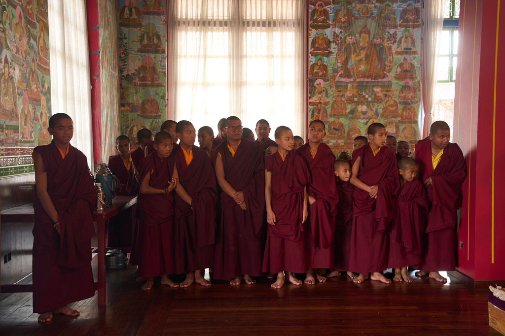 Buddhist monks attend a ritual at Dzarong Thubten Mindrol Dongä Monastery in Kathmandu, Nepal, Tuesday, April 14, 2026. (AP Photo/Niranjan Shrestha)