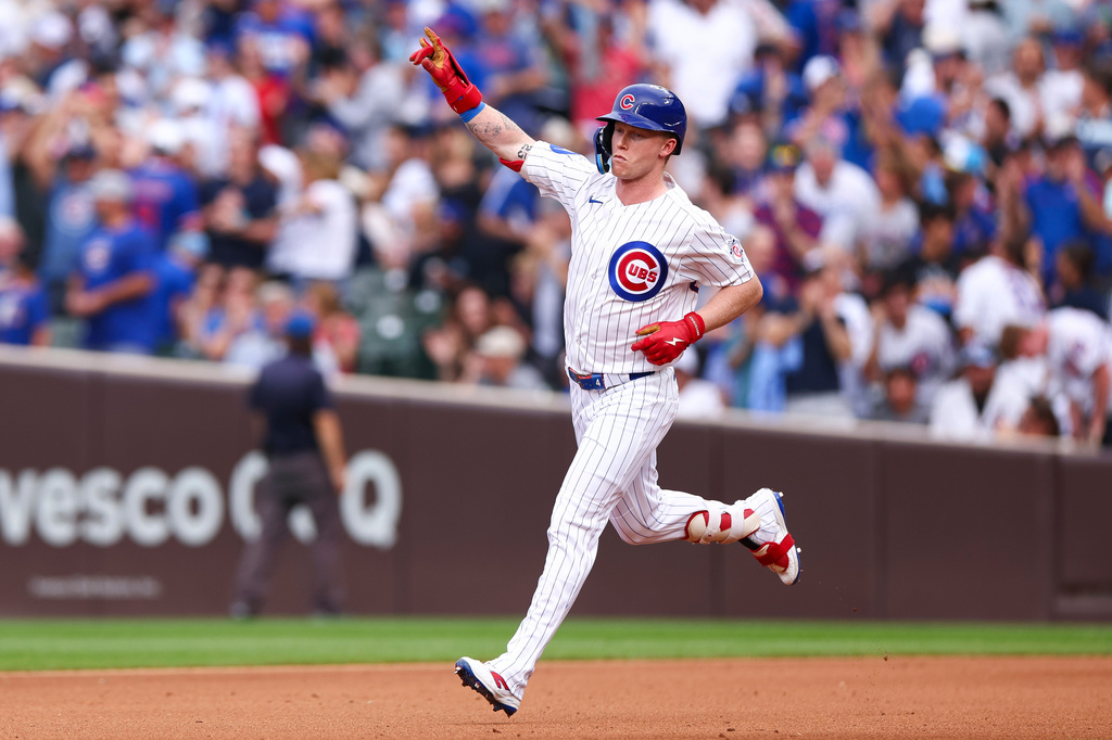 Chicago Cubs designated hitter Pete Crow-Armstrong gestures while running the bases after hitting a home run during the fourth inning of a baseball game against the Los Angeles Dodgers in Chicago, Wednesday, Aug. 5, 2026. (AP Photo/Jessie Alcheh)