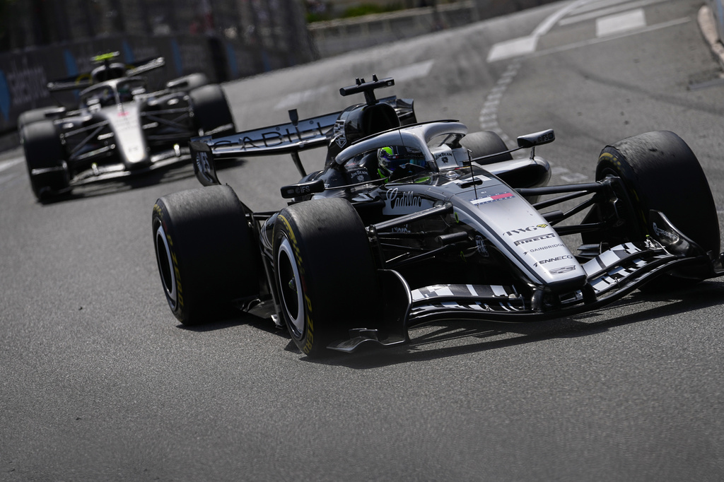 Mexico's Sergio Perez steers his Cadillac during the Formula One Monaco Grand Prix race at the Monaco racetrack, Sunday, June 7, 2026. (AP Photo/Fatima Shbair)