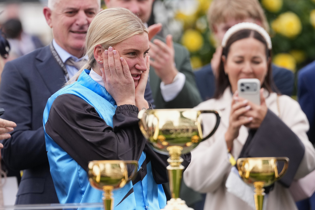 Jockey Jamie Melham reacts after riding Half Yours to win the Melbourne Cup horse race in Melbourne, Australia, Tuesday, Nov. 4, 2025. (AP Photo/Asanka Brendon Ratnayake)