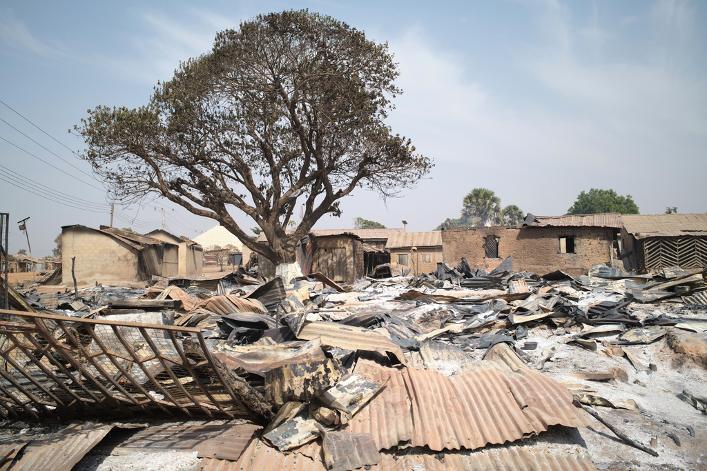 Razed homes are seen days after an attack that left dozens dead in the Muslim-majority village of Woro, Nigeria, Thursday, Feb. 5, 2026, that officials said was targeted for refusing extremist ideology. (AP Photo/Pelumi Salako)