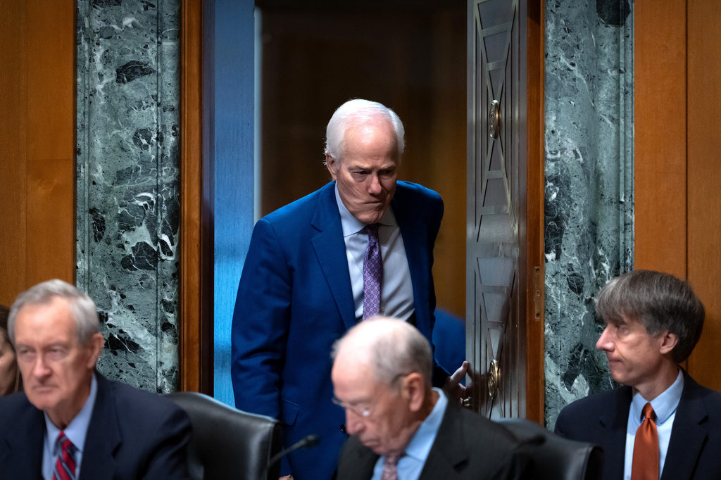 Sen. John Cornyn, R-Texas, arrives for a hearing of the Senate Finance Committee on Capitol Hill, Thursday, July 30, 2026, in Washington. (AP Photo/Mark Schiefelbein)