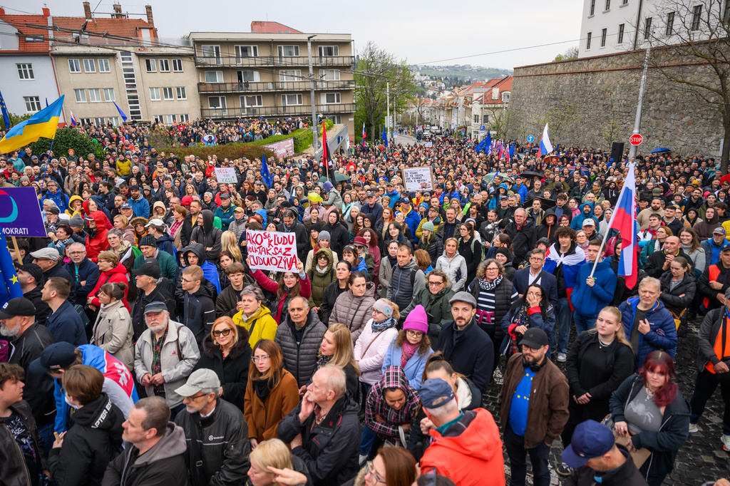 People attend a protest organised by Progressive Slovakia in front of Parliament in Bratislava, Slovakia, Tuesday, April 14, 2026. (Jaroslav Novak/TASR via AP)