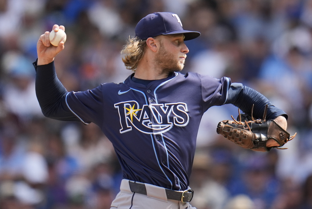 Tampa Bay Rays starting pitcher Shane Baz (11) throws against the Chicago Cubs during the second inning of a baseball game Friday, Sept. 12, 2025, in Chicago. (AP Photo/Erin Hooley)