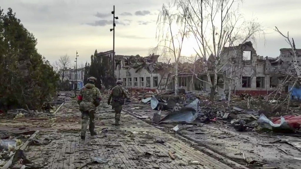 FILE - In this photo taken from video distributed by the Russian Defense Ministry Press Service on Thursday, March 13, 2025, Russian soldiers patrol an area in Sudzha, in the Kursk region of Russia, after it was taken over by Russian troops. (Russian Defense Ministry Press Service via AP, File)