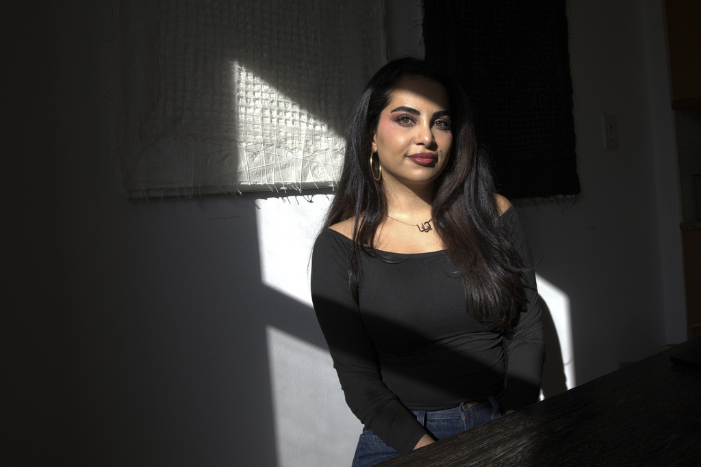 Ariana Afshar, one of many Iranian American content creators struggling to amplify the voices of Iranians amidst an internet blackout in Iran during the ongoing war, poses for a photo Monday, March 9, 2026, in New York. (AP Photo/Safiyah Riddle)