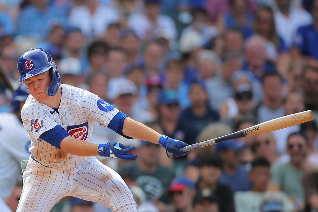 Chicago Cubs' James Triantos strikes out during the sixth inning of a baseball game against the St. Louis Cardinals, Sunday, Aug. 16, 2026, in Chicago. (AP Photo/Melissa Tamez)