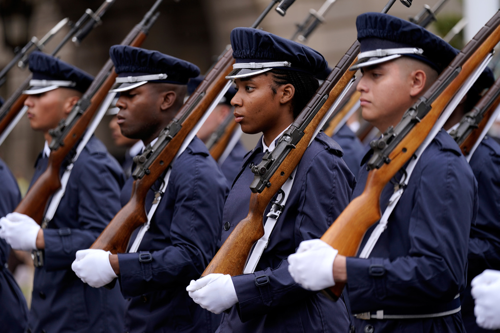 Parade participants march and perform near the National Mall along Constitution Avenue in Washington to commemorate the Memorial Day, Monday, May 25, 2026, coinciding with the nation's 250th anniversary celebrations. (AP Photo/Jose Luis Magana)