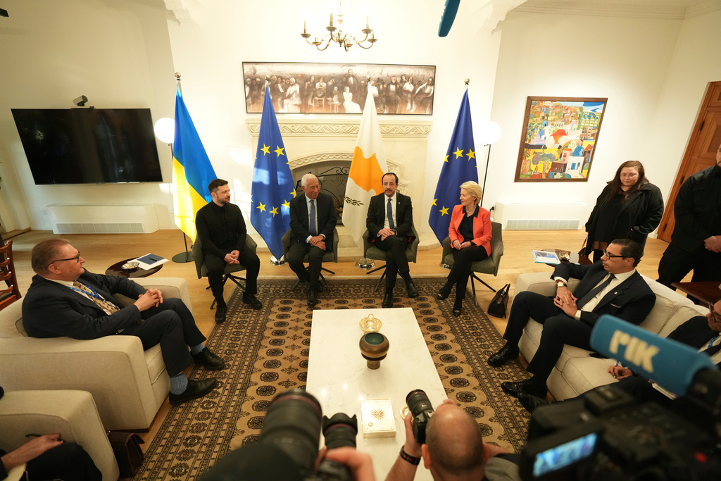 Ukraine's President Volodymyr Zelenskyy, left, European Council President Antonio Costa, second left, European Commission President Ursula von der Leyen, right, and Cyprus' President Nikos Christodoulides join a meeting at the presidential palace in Nicosia, Cyprus, Wednesday, Jan. 7, 2026. (AP Photo/Petros Karadjias, Pool)