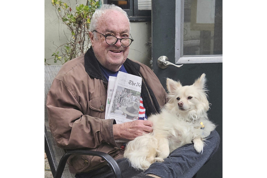 This October 2025 photo provided by Glenn Lippman shows Andy Lippman with his dog, Scout. (Glenn Lippman via AP)