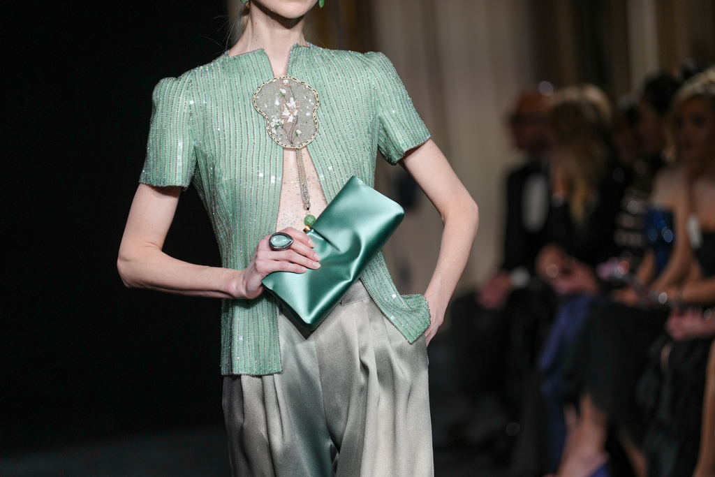 A model wears a creation as part of the Giorgio Armani Prive Spring/Summer 2026 Haute Couture collection presented in Paris, Tuesday, Jan. 27, 2026. (AP Photo/Aurelien Morissard)