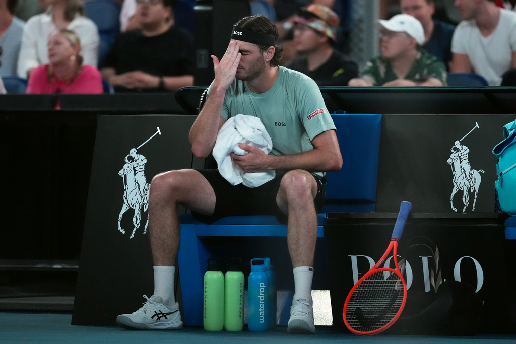 Taylor Fritz of the U.S. reacts during his third round match against Stan Wawrinka of Switzerland at the Australian Open tennis championship in Melbourne, Australia, Saturday, Jan. 24, 2026. (AP Photo/Asanka Brendon Ratnayake)