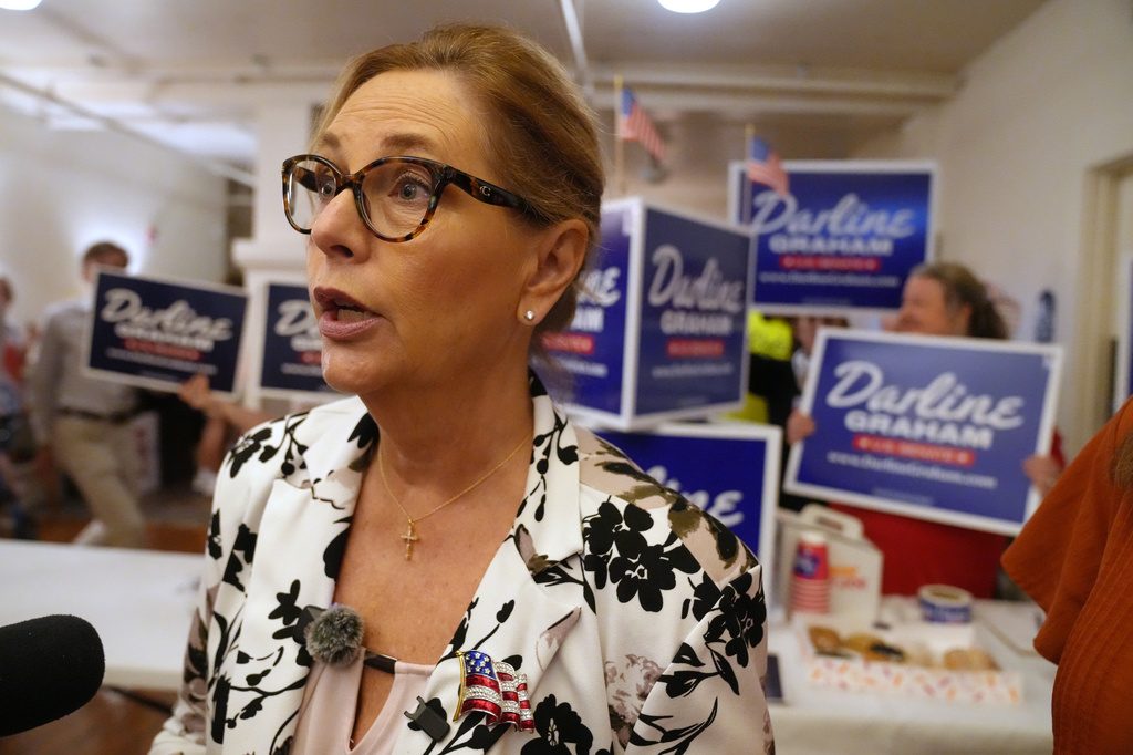 Sen. Darline Graham, R-S.C., speaks with reporters following at a candidate event for hopefuls vying in a special Republican primary to replace her late brother Sen. Lindsey Graham, R-S.C., on November ballots, Saturday, Aug. 8, 2026, in Florence, S.C. (AP Photo/Meg Kinnard)