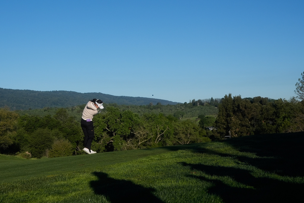 Lydia Ko, of New Zealand, hits from the 11th fairway during the first round of the LPGA Fortinet Founders Cup golf tournament, Thursday, March 19, 2026, in Menlo Park, Calif. (AP Photo/Jeff Chiu)