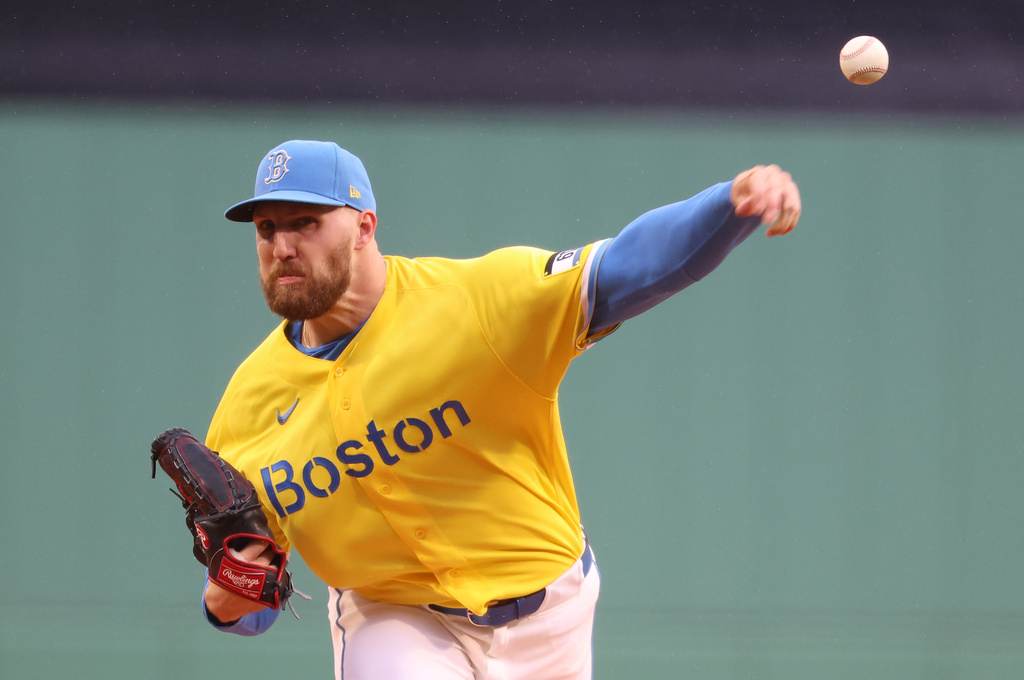 Boston Red Sox pitcher Garrett Crochet throws from the mound during the first inning of a baseball game against the Detroit Tigers, Sunday, April 19, 2026, in Boston. (AP Photo/Mark Stockwell)