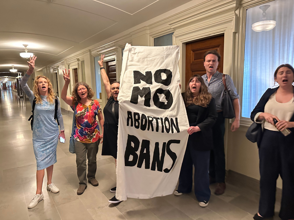 Abortion-rights activists protest in the Missouri Capitol on May 14, 2025, in Jefferson City, as the state Senate approves a proposed constitutional amendment to restrict abortion. (AP Photo/David A. Lieb)