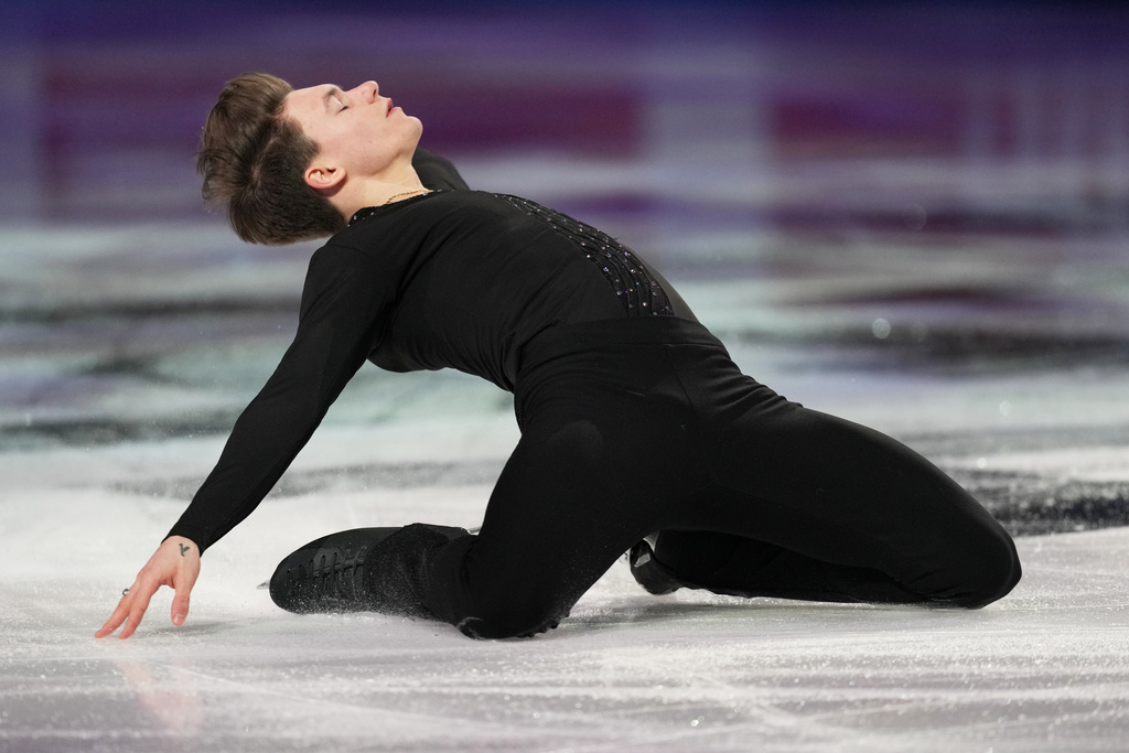 Maxim Naumov skates during the "Making Team USA" performance at the U.S. Figure Skating Championships, Sunday, Jan. 11, 2026, in St. Louis. (AP Photo/Stephanie Scarbrough)