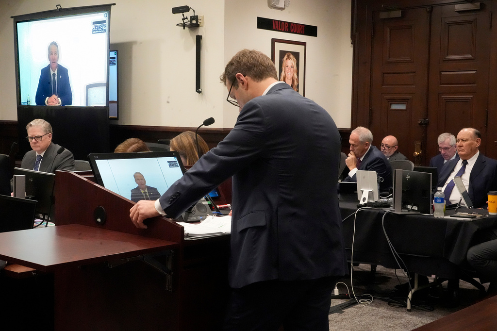 Defense Attorney Steve Grimes questions witness, Sen. Jon Husted , R-Ohio , as he testifies via Zoom during the trial of ex-FirstEnergy Senior Vice President Michael Dowling and former FirstEnergy CEO Chuck Jones resumes in Summit County Common Pleas Judge Susan Baker Ross's courtroom in Akron on March 11, 2026. (Mike Cardew /Akron Beacon Journal via AP, Pool)