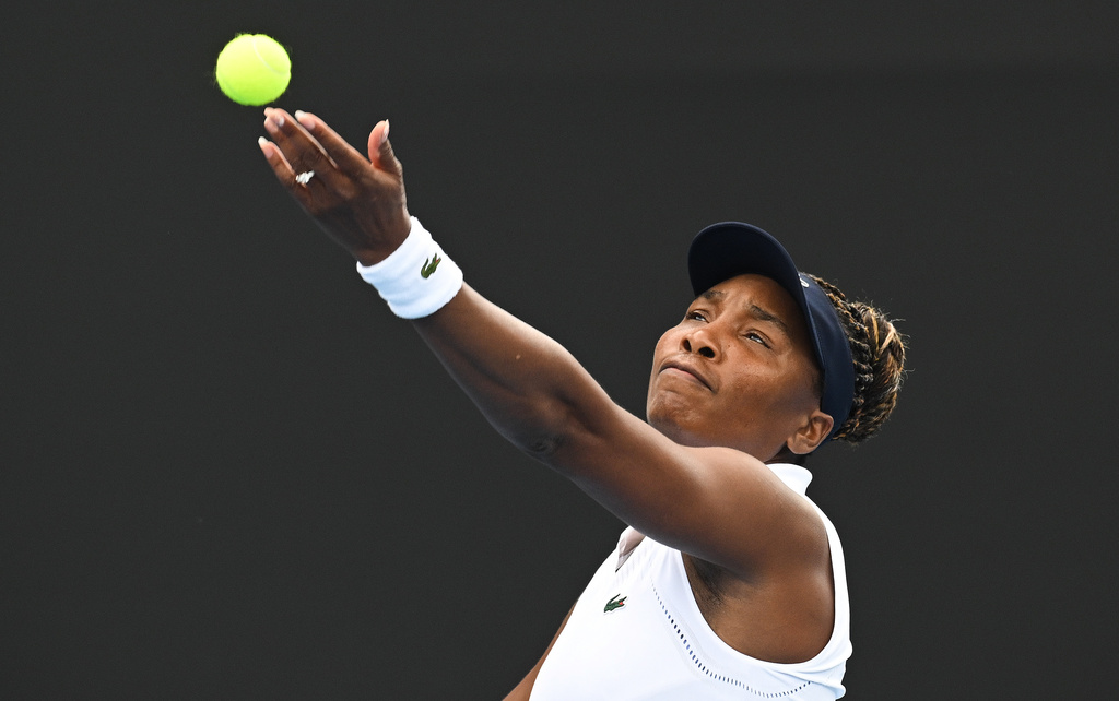Venus Williams of the U.S. prepares to serve to Magda Linette of Poland during her singles match ASB Classic Women's Tennis Tournament in Auckland, New Zealand, Tuesday Jan. 6, 2026. (Andrew Cornaga/Photosport via AP)