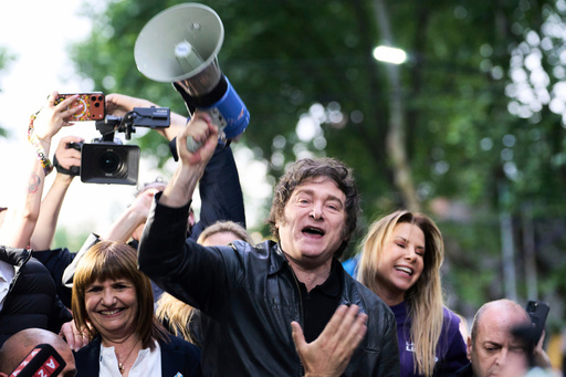 President Javier Milei holds a megaphone while leading a campaign rally ahead of legislative national elections, in Tres de Febrero, Buenos Aires province, Argentina, Friday, Oct. 17, 2025. (AP Photo/Rodrigo Abd) President Javier Milei holds a megaphone while leading a campaign rally ahead of legislative national elections, in Tres de Febrero, Buenos Aires province, Argentina, Friday, Oct. 17, 2025. (AP Photo/Rodrigo Abd)