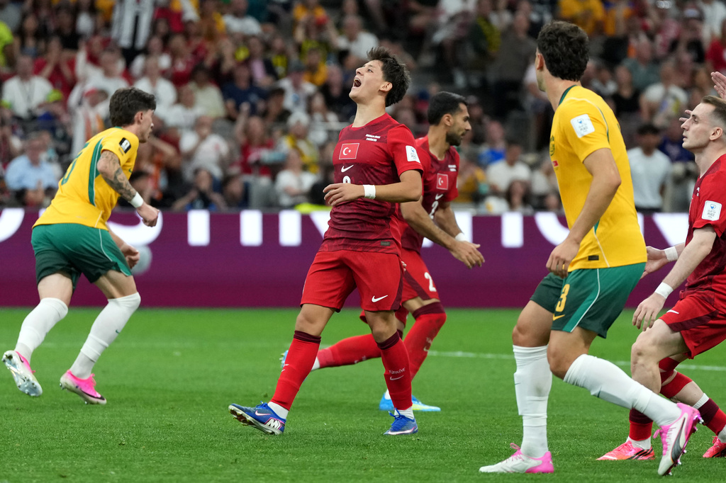Turkey's Arda Guler (8) reacts after missing a shot during the World Cup Group D soccer match between Australia and Turkey in Vancouver, British Columbia, Saturday, June 13, 2026. (AP Photo/Abbie Parr)