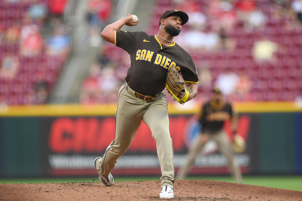San Diego Padres' Randy Vásquez pitches during the first inning of a baseball game against the Cincinnati Reds, Tuesday, Sept. 1, 2026, in Cincinnati. (AP Photo/Tanner Pearson)