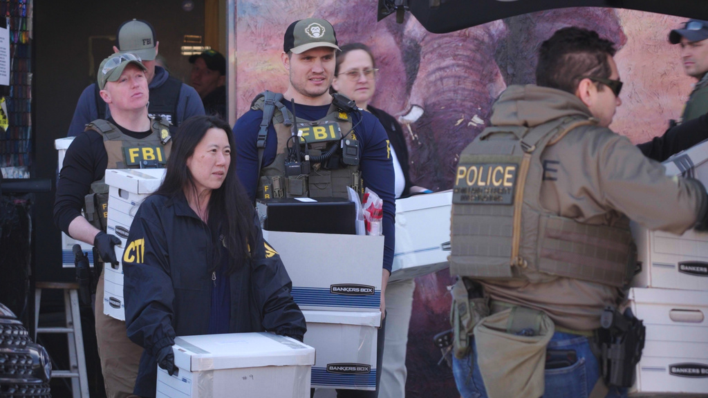 State and federal agents remove boxes of evidence collected from Metro Learning Center on Tuesday, April 28, 2026 in Minneapolis, Minn. (AP Photo/Mark Vancleave)