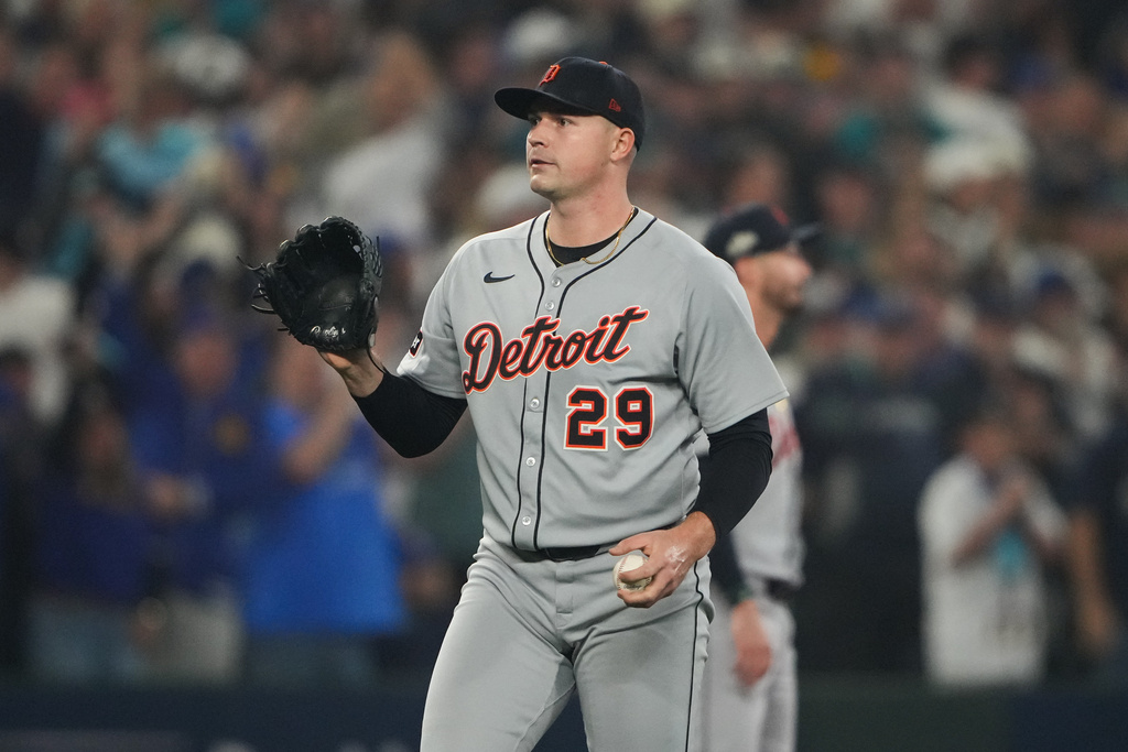 Detroit Tigers pitcher Tarik Skubal (29) reacts after Seattle Mariners first baseman Josh Naylor hit a double during the second inning in Game 5 of baseball's American League Division Series Friday, Oct. 10, 2025, in Seattle. (AP Photo/Lindsey Wasson)