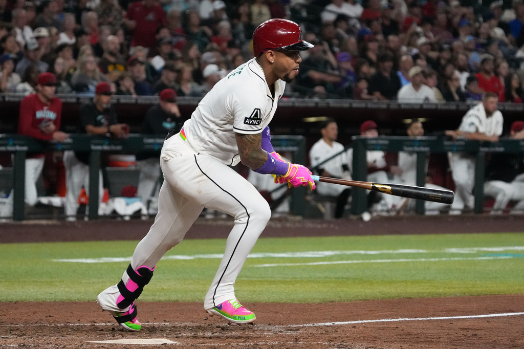 Arizona Diamondbacks' Ketel Marte hits a single against the Los Angeles Angels in the first inning of a baseball game, Tuesday, June 16, 2026, in Phoenix. (AP Photo/Rick Scuteri)