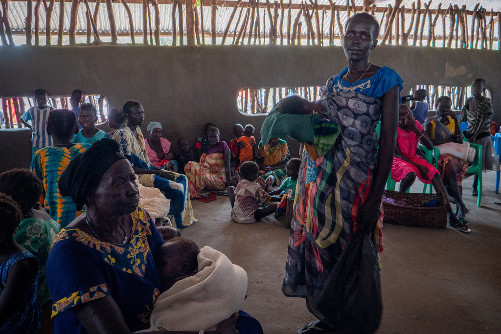 Nyaphan Nyang Lual, 36 years old, an internally displaced person, shelters at a church compound in Akobo, South Sudan, Saturday, Feb. 21, 2026. (AP Photo/Florence Miettaux)