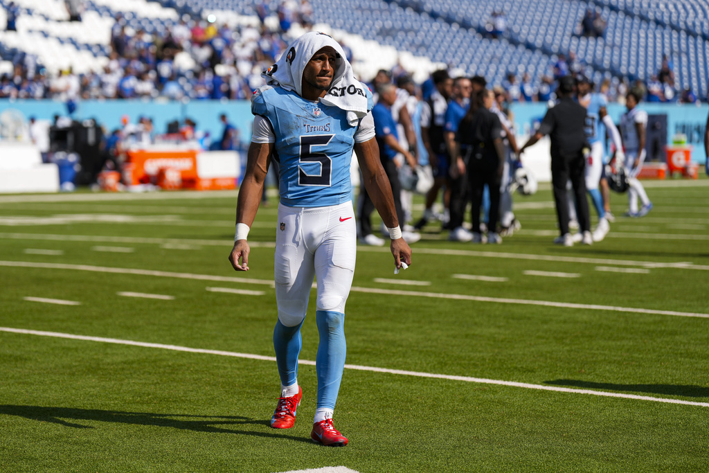 Tennessee Titans wide receiver Elic Ayomanor (5) walks off the field following an NFL football game against the Indianapolis Colts Sunday, Sept. 21, 2025, in Nashville, Tenn. (AP Photo/George Walker IV)