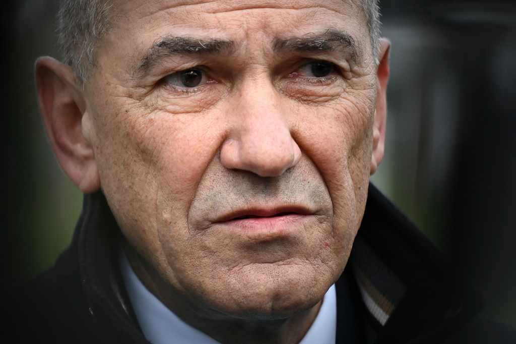 Former Slovenian Prime Minister Janez Jansa addresses the media outside a polling station in Arnace, Slovenia, Sunday, March 22, 2026. (AP Photo/Denes Erdos)