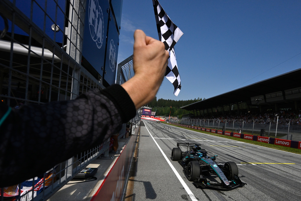 Mercedes driver George Russell of Britain crosses the finish line to win the Austrian F1 Grand Prix, in Spielberg, Austria, Sunday, June 28, 2026. (AP Photo/Denes Erdos,Pool)
